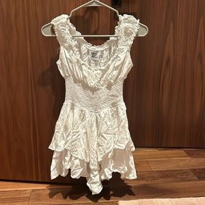 Princess Polly romper; originally size 2 but shrunk